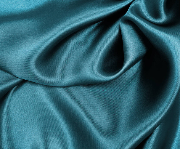 Smooth elegant blue silk or satin luxury cloth texture can use as abstract background. Luxurious Christmas background or New Year background design   - 写真・画像