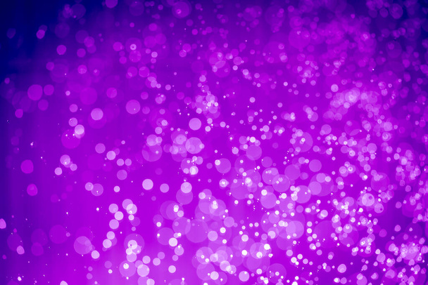 Abstract violet paars glitter lichten onscherpe bokeh achtergrond - Foto, afbeelding