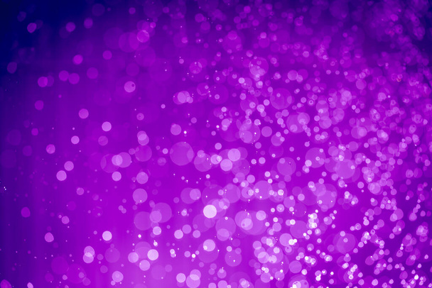 Abstrakte violett lila glitzernde Lichter defokussiert Bokeh Hintergrund - Foto, Bild
