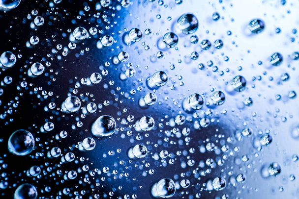 Water droplets on blue background - Zdjęcie, obraz