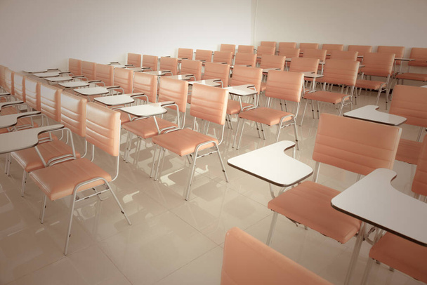 Vintage tone of Orange school chairs in empty classrooms background - Photo, Image