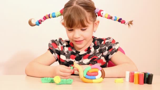 Happy little girl play with plasticine - Footage, Video