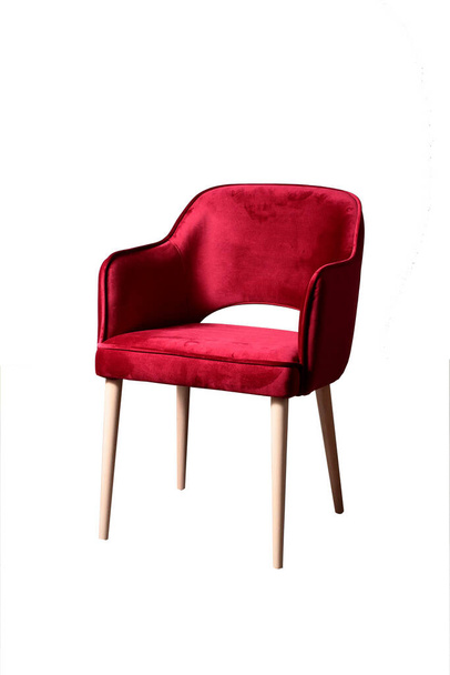 Red armchair with wooden legs - Фото, изображение
