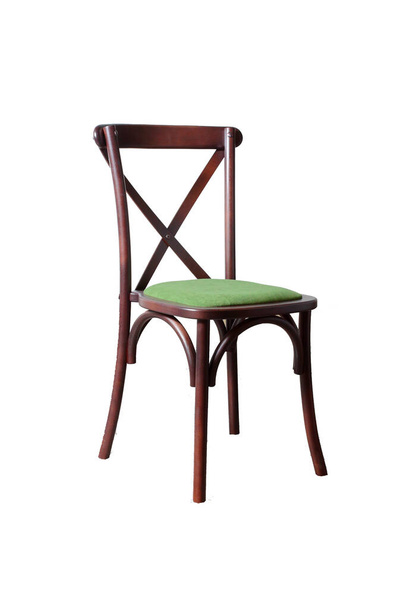 designer chair with a hard back on a wooden base with an upholstered seat upholstered in green fabric - Zdjęcie, obraz