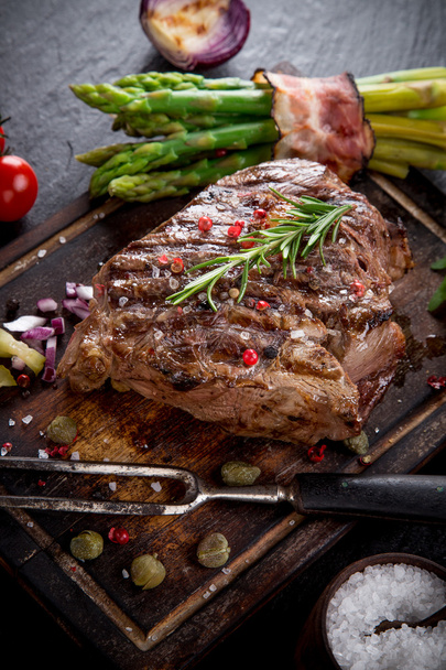 Beef steak on stone table - Foto, Imagen