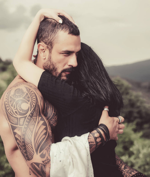 Love story. Beautiful young couple hugging. Love concept. Couple is hugging. Passion love couple. Romantic moment. Handsome muscular guy and amazing woman. - Foto, afbeelding