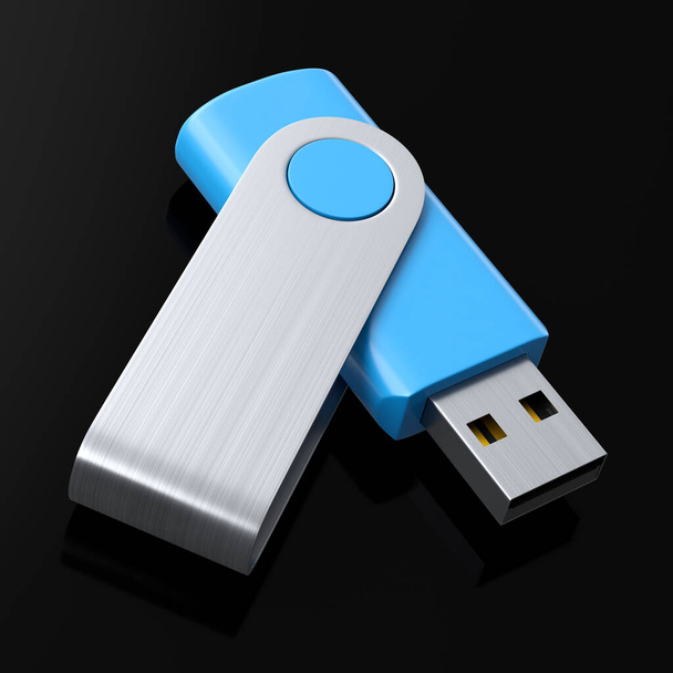 Portable blue USB flash drive stick for workspace isolated on black background - Fotó, kép