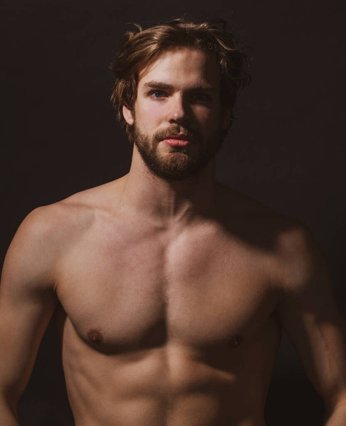 Portrait of young sexy handsome man with bare, torso, athletic gay, male model, muscular hot boy. - Fotó, kép