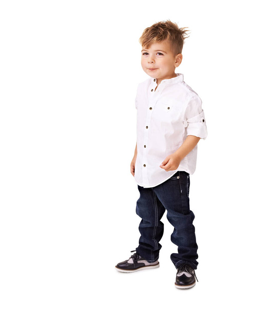 Trendy little man. A cute little boy posing on a white background. - Foto, Imagen