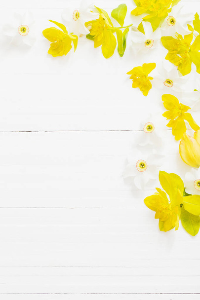 spring flowers on wooden background - Photo, image