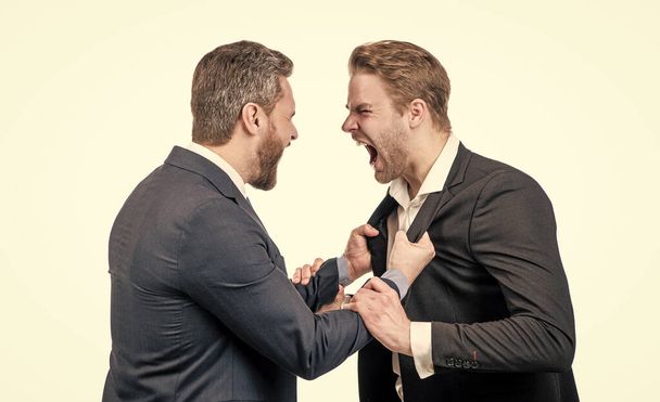 two colleagues have disagreement and conflict. businessmen face to face. - Photo, Image