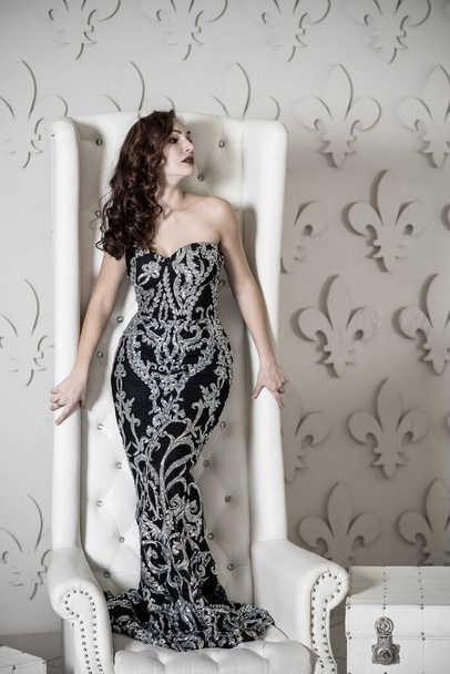 Evening dresses concept, elegant fancy style. Woman in evening dress. Clothes for ladies, inspiration - Foto, afbeelding