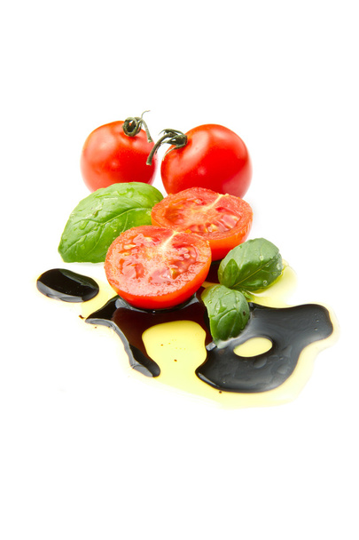 Fresh tomato with balsamic vinegar - Foto, afbeelding