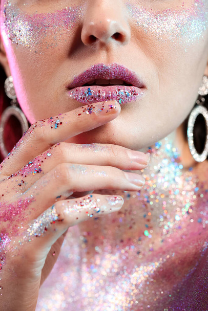 Beautiful young woman with glitters on her face and body, closeup - Φωτογραφία, εικόνα