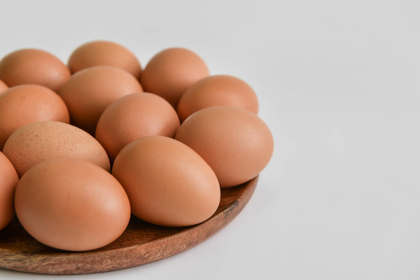 Plate with fresh chicken eggs on light background, closeup - Photo, Image