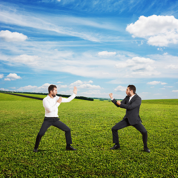 battle between two young businessmen - Photo, Image