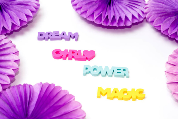 Flatlay. Colorful paper decoration and words: girl, power, magic, dream. Concept of feminism and women's day. - Photo, Image