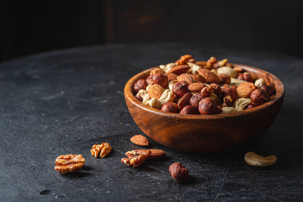 Mixed nuts in a bowl - Photo, Image