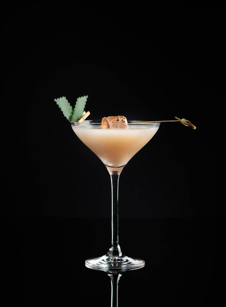 Cocktail in a glass on a black background - Foto, Imagem