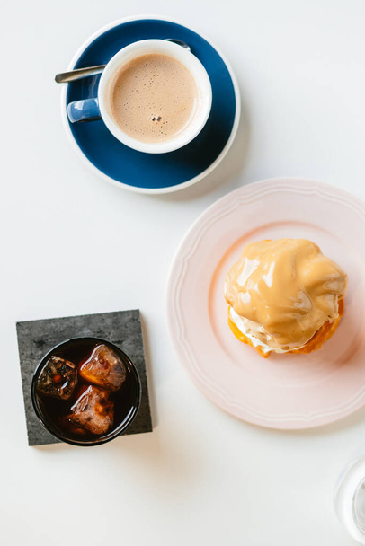 breakfast with coffee and croissant on white background - Valokuva, kuva