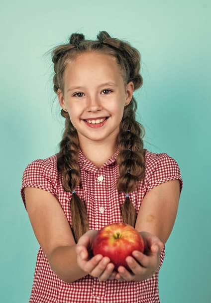 happy teen kid with apples full of vitamin picked from autumn harvest, autumn - Photo, image