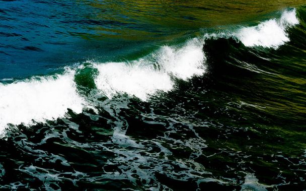 Surf waves with white water crests rolling in at Tolaga Bay, New Zealand. - Photo, Image
