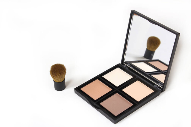 Cosmetic Palette and brush on White Background Contour and Highlighter - Photo, Image