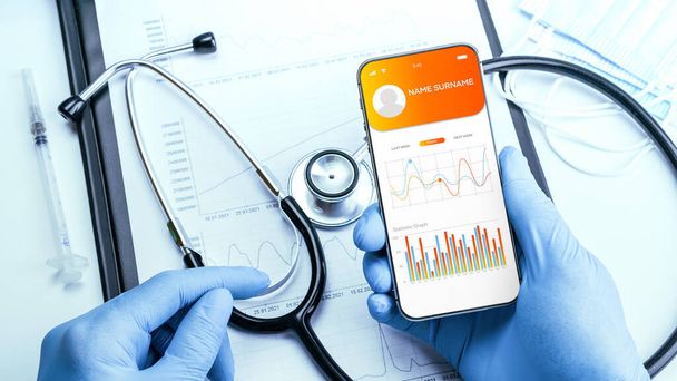 Healthcare app medical technology. Doctor holding digital smartphone. Healthcare medicine app on mobile phone screen. Health Check with digital system support - Photo, image