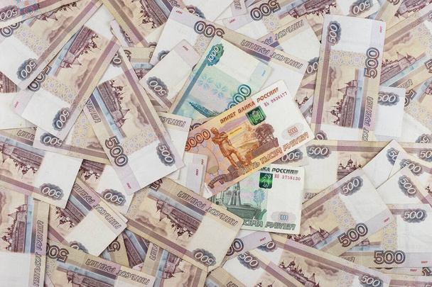 500 russian rubles bills lies in big pile. Rich life conceptual background. Big amount of money - Foto, afbeelding
