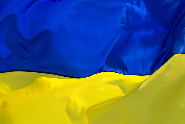 Tło flagi Ukrainy, Duży żółty niebieski ukraińska flaga państwowa, niepodległość narodowa, Konstytucja, Dzień Flagi. Wojna na Ukrainie - Zdjęcie, obraz