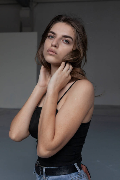 portrait of a beautiful girl in a black top - Photo, Image