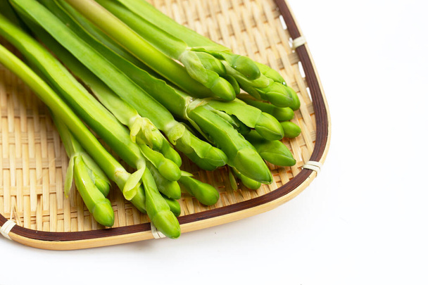 Limnocharis flava in bamboo basket  - Фото, изображение