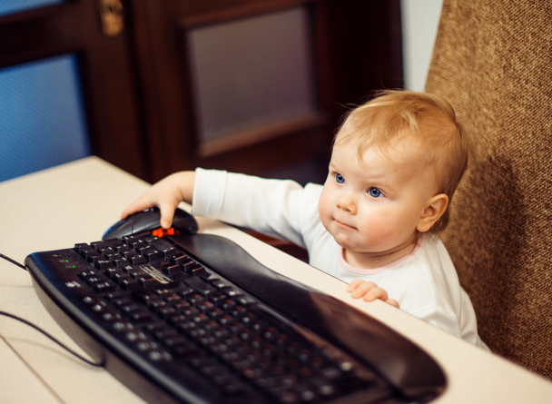 Little child with keyboard  - Zdjęcie, obraz