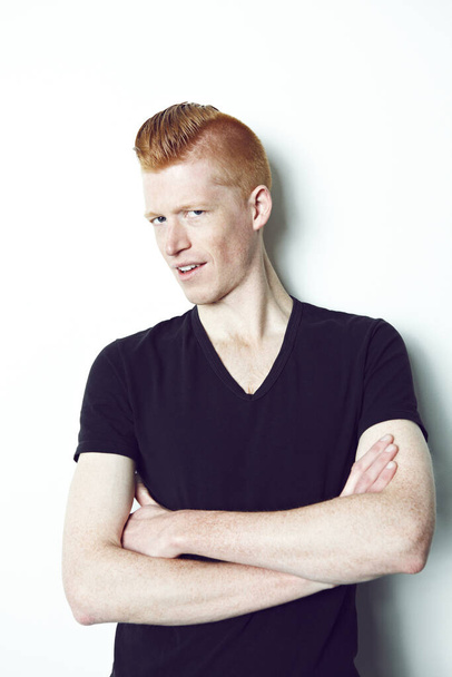 Mr Cool. An trendy redheaded man posing in front of a white background. - Foto, imagen