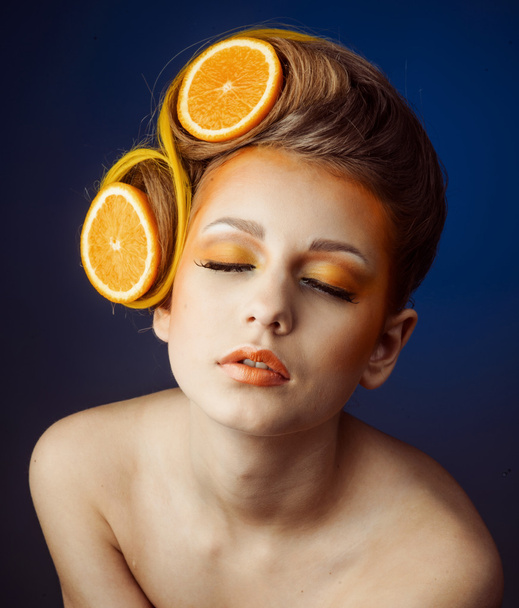 woman with fruit in hair - Photo, Image