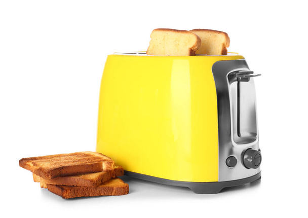 Modern toaster with bread slices on white background - Photo, Image