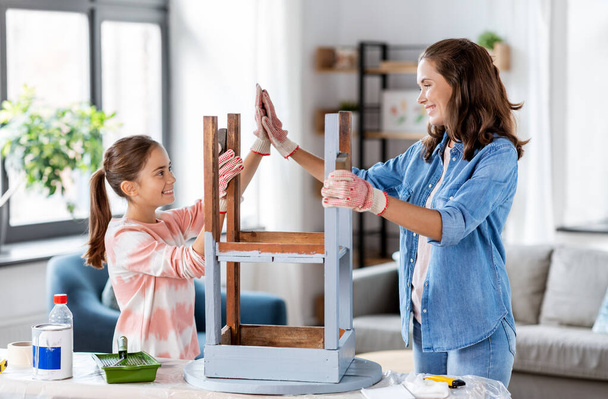 mother and daughter making high five gesture - Photo, image