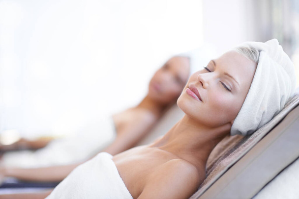 Theres nothing better than a day at the spa. A beautiful young woman relaxing at the beauty spa. - Photo, Image
