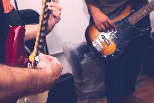 GUITAR AND BASS REHEARSING - 写真・画像