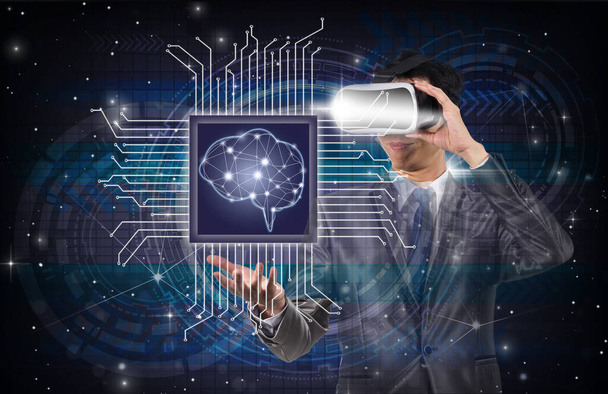 Dubbele blootstelling van Aziatische zakenman dragen van virtual reality houden van de kunstmatige intelligentie van hersentechnologie over Innovatie digitale scherm achtergrond, AI en technologie en innovatie concept - Foto, afbeelding