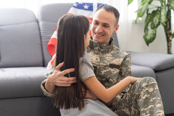 veteran and his daughter with a flag - Photo, Image
