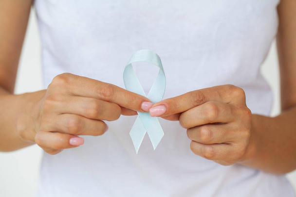 Woman with blue ribbon, prostate cancer awareness - Фото, зображення