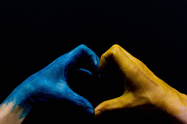 Blue and yellow ukrainian hands isolated symbolic - Valokuva, kuva