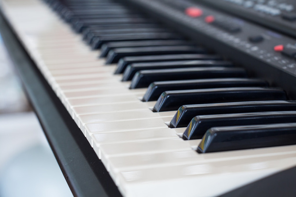 achtergrond van synthesizer toetsenbord - Foto, afbeelding