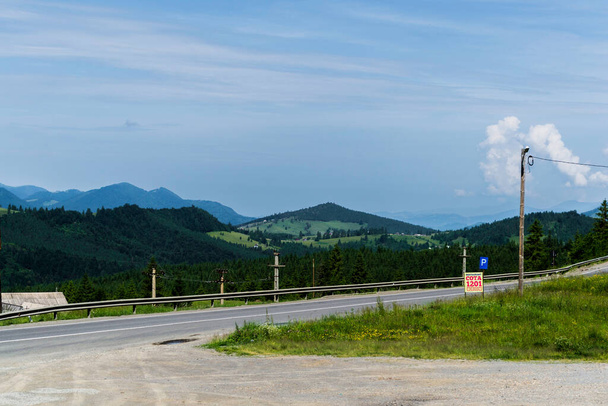 TIHUTA PASS, ROMANIA - JUNE 19, 2019: Beautiful landscape in Tihuta pass between Transylvania and Moldova land. - Фото, изображение