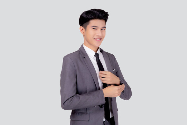 Portrait young asian businessman in suit smiling with confident and friendly isolated on white background, business man smart with success, manager or executive with handsome and leadership. - Photo, Image
