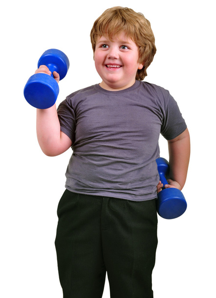 Isolated portrait of smiling kid exercising with dumbbells - Φωτογραφία, εικόνα