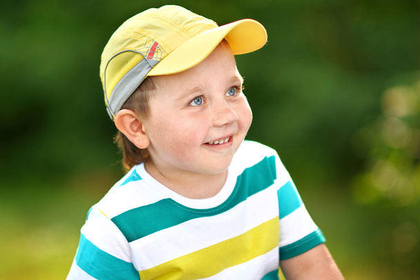 Portrait of cute little boy  in summer  - Photo, Image