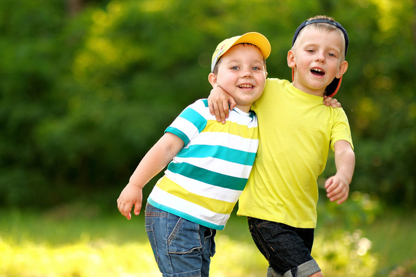 portrait of two little boys friends  in summer  - Foto, Bild