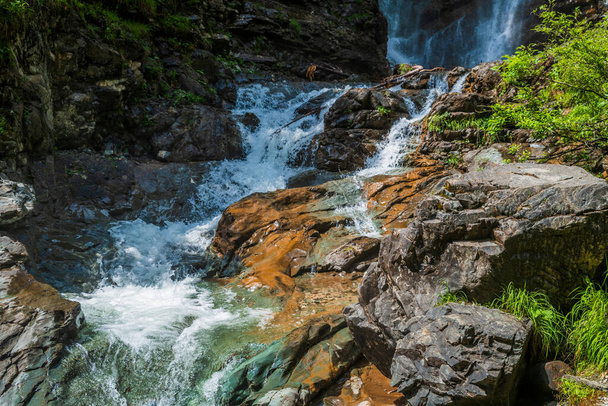 Small waterfall in mountains at Sappada village, Italy - Photo, Image